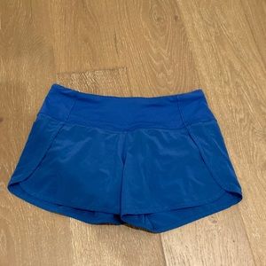 Size 4 women’s blue run times shorts- like new barely worn